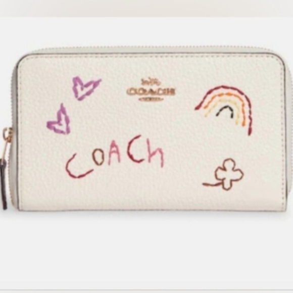 COACH Medium ID Zip Wallet
With Diary Embroidery in Gold/ Chalk - Picture 1 of 9